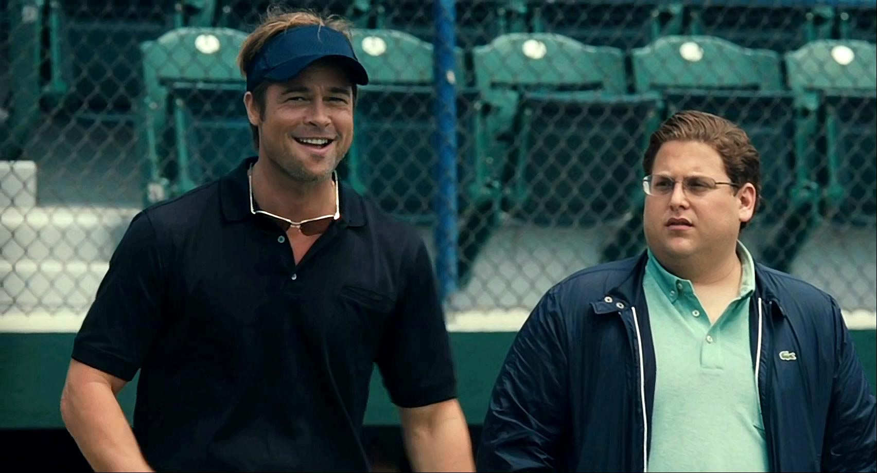 Brad Pitt and Jonah Hill as Billy Beane and Peter Brand in Moneyball